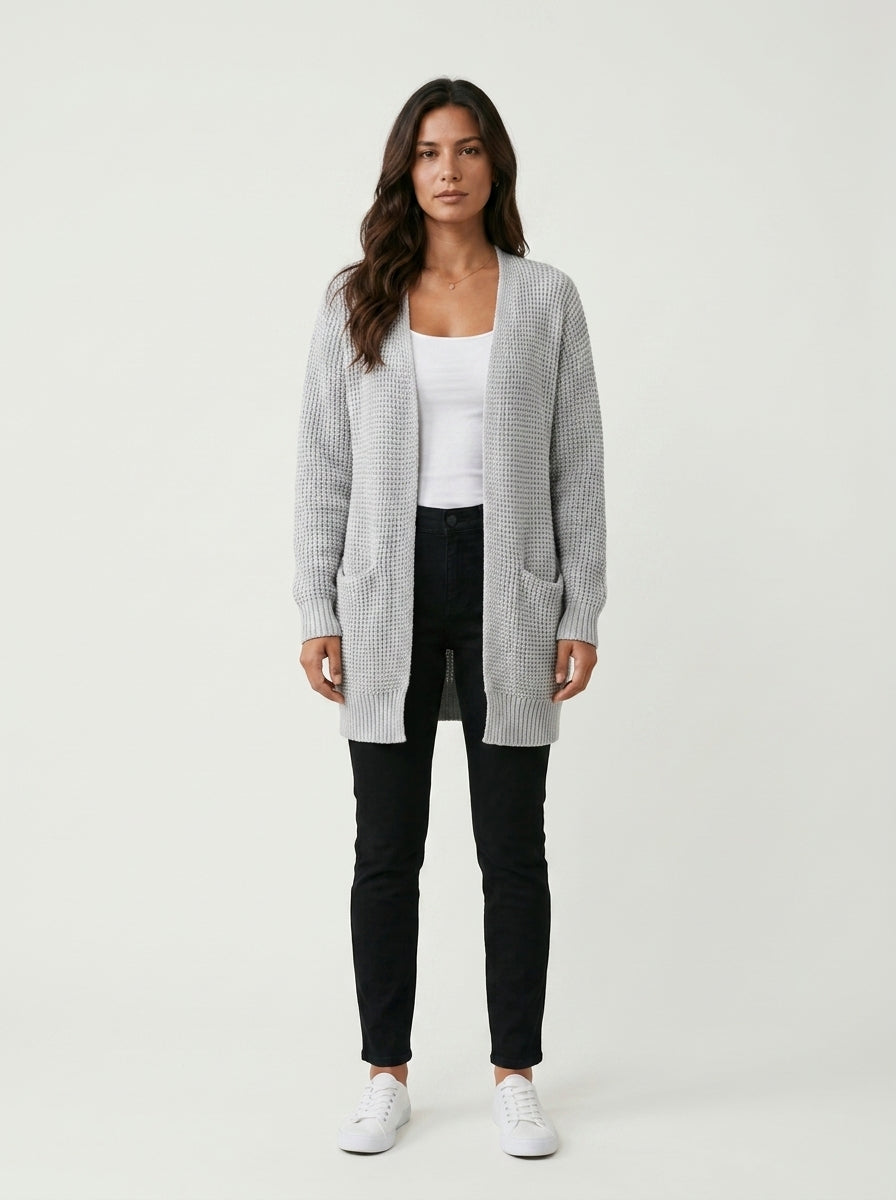 Long knit cardigan — On Model - Neutral | Generated by Modelize