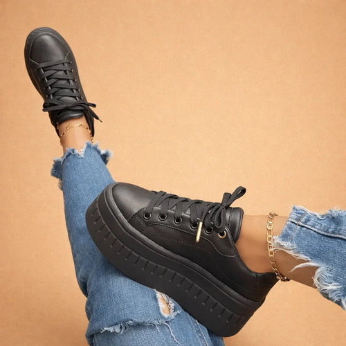 Model wearing tan platform sneakers with lace-up design – ELEGENZE