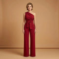 Model wearing one-shoulder wide-leg jumpsuit in burgundy – ELEGENZE