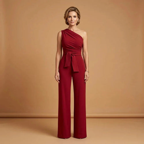 Model wearing one-shoulder wide-leg jumpsuit in burgundy – ELEGENZE
