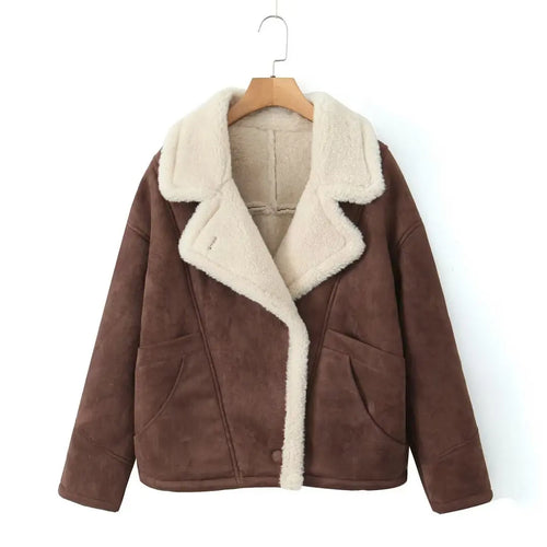 Model wearing oversized shearling longline coat in Dark Brown – ELEGENZE