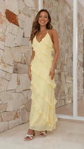 Tiered ruffle halter-neck maxi dress in yellow full length – ELEGENZE