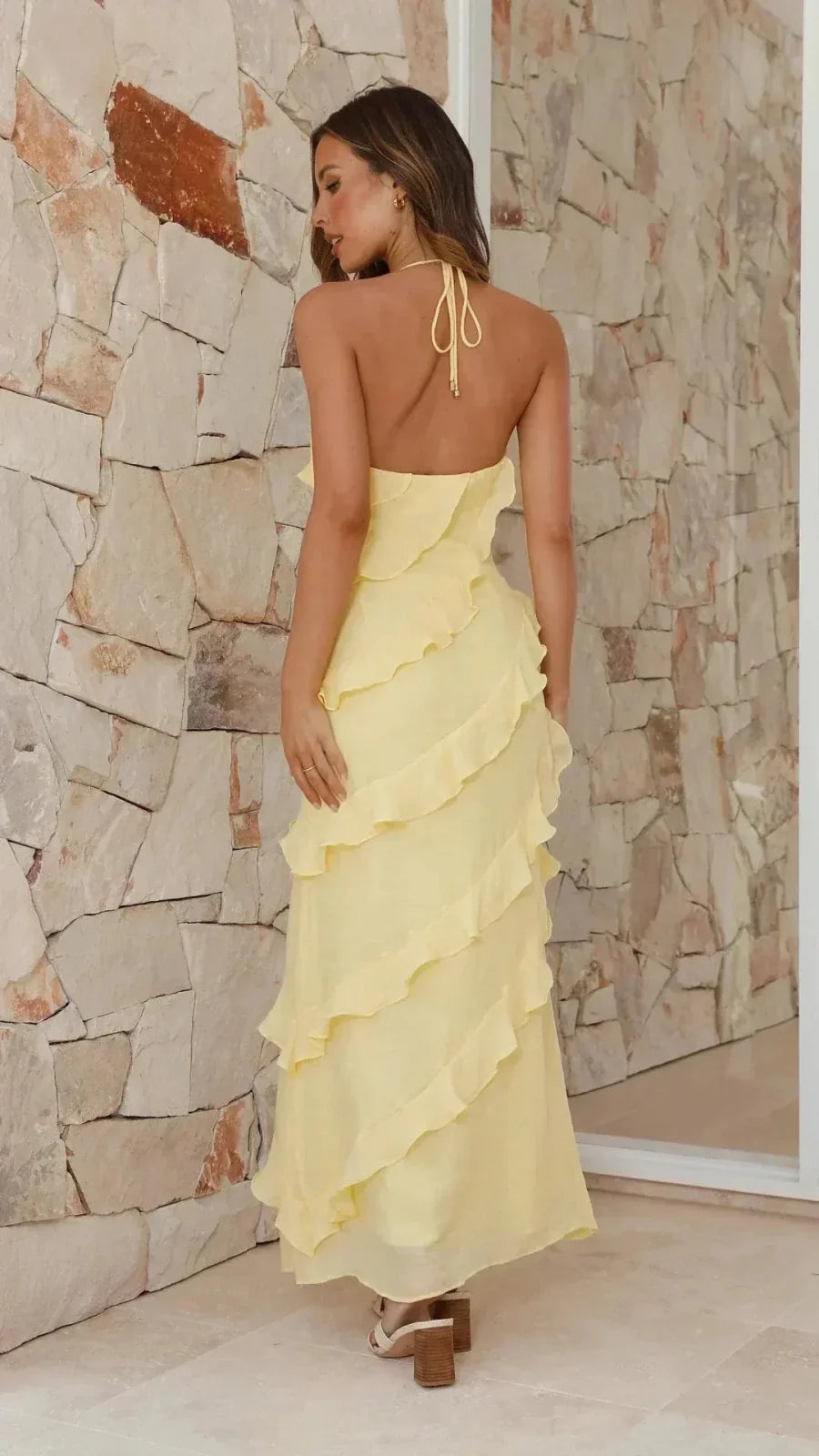 Model wearing yellow tiered ruffle backless maxi dress – ELEGENZE