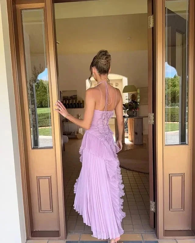 Model wearing ruffle halter maxi dress in purple – ELEGENZE
